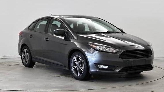 FORD FOCUS 2018 1FADP3FE8JL214581 image