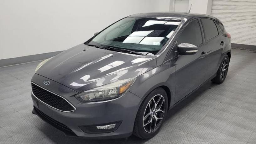 FORD FOCUS 2018 1FADP3M25JL297816 image