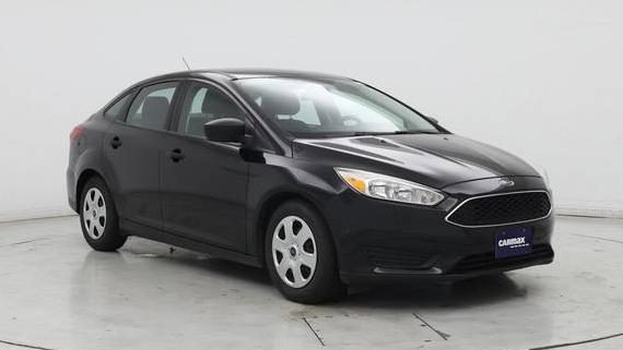 FORD FOCUS 2018 1FADP3E23JL276087 image