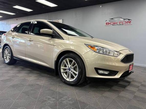 FORD FOCUS 2018 1FADP3FE4JL293604 image