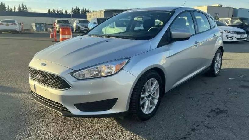 FORD FOCUS 2018 1FADP3F21JL291055 image