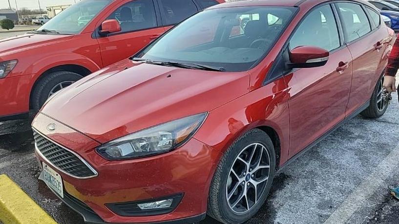 FORD FOCUS 2018 1FADP3M21JL302946 image