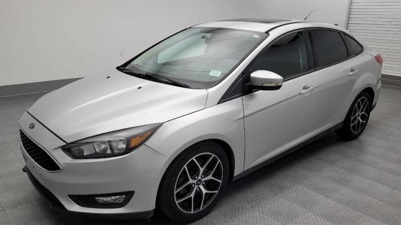 FORD FOCUS 2018 1FADP3H26JL278427 image