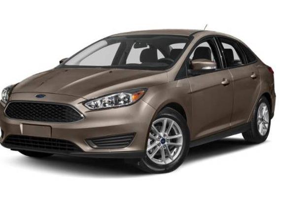 FORD FOCUS 2018 1FADP3E21JL244612 image