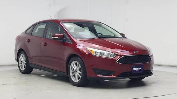 FORD FOCUS 2017 1FADP3F26HL323038 image