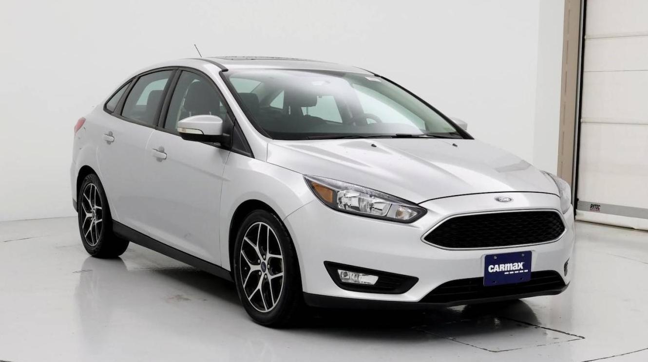 FORD FOCUS 2017 1FADP3H25HL328681 image