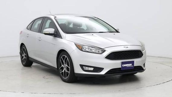 FORD FOCUS 2017 1FADP3H27HL212981 image
