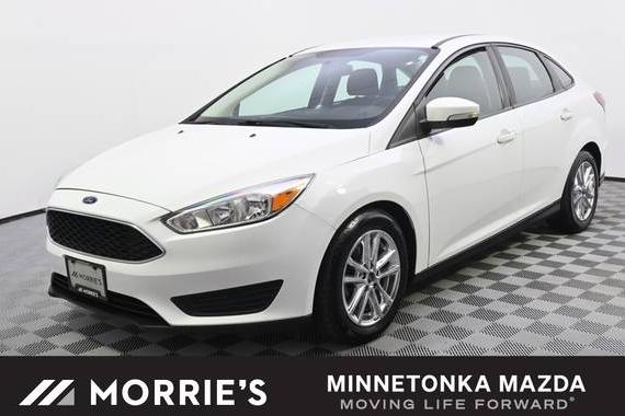 FORD FOCUS 2017 1FADP3F27HL340396 image