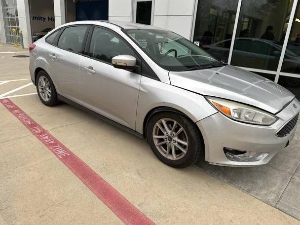 FORD FOCUS 2017 1FADP3F21HL214180 image