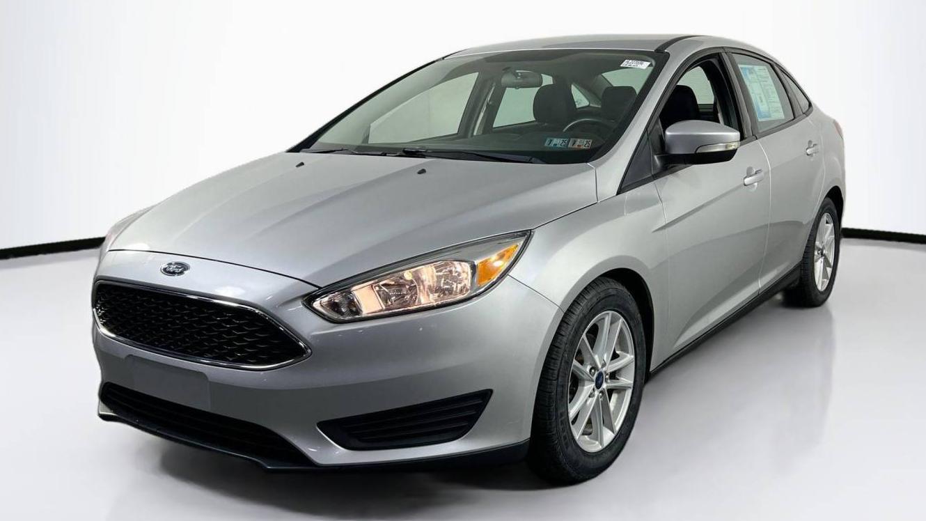 FORD FOCUS 2017 1FADP3F20HL223596 image