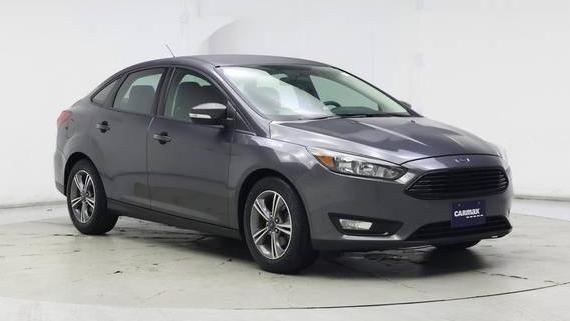 FORD FOCUS 2017 1FADP3FE8HL309734 image