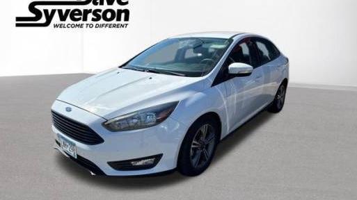 FORD FOCUS 2017 1FADP3FE1HL284661 image