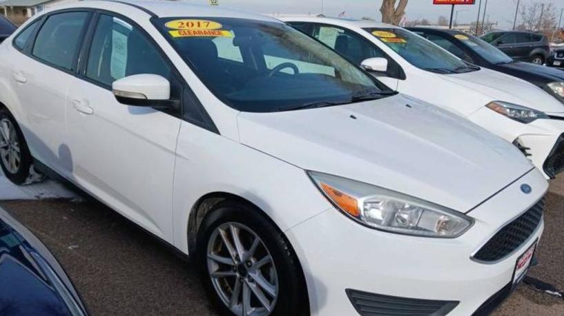 FORD FOCUS 2017 1FADP3F24HL233130 image