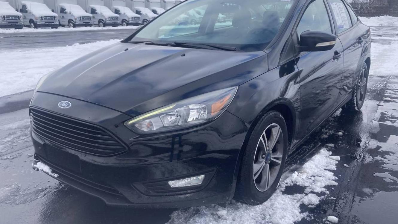 FORD FOCUS 2017 1FADP3FE0HL328147 image