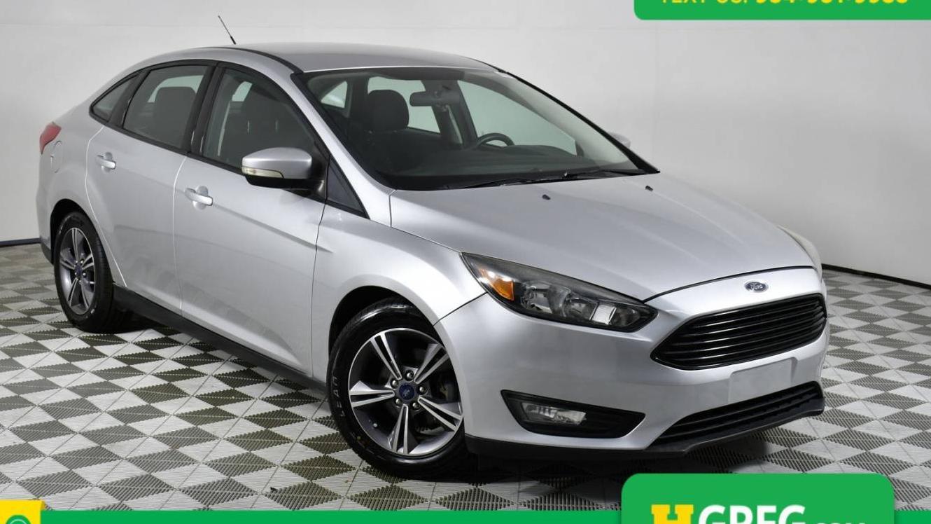 FORD FOCUS 2017 1FADP3FE4HL292253 image