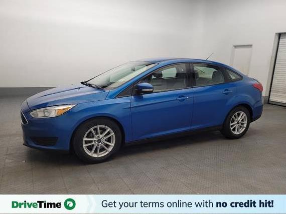 FORD FOCUS 2017 1FADP3F24HL240482 image