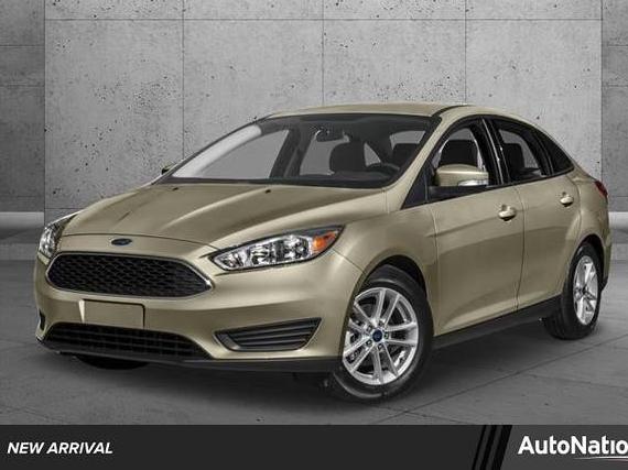 FORD FOCUS 2017 1FADP3FE4HL308385 image