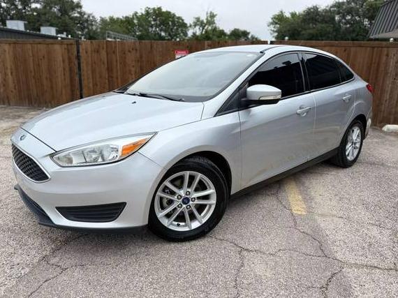 FORD FOCUS 2017 1FADP3FE4HL304174 image