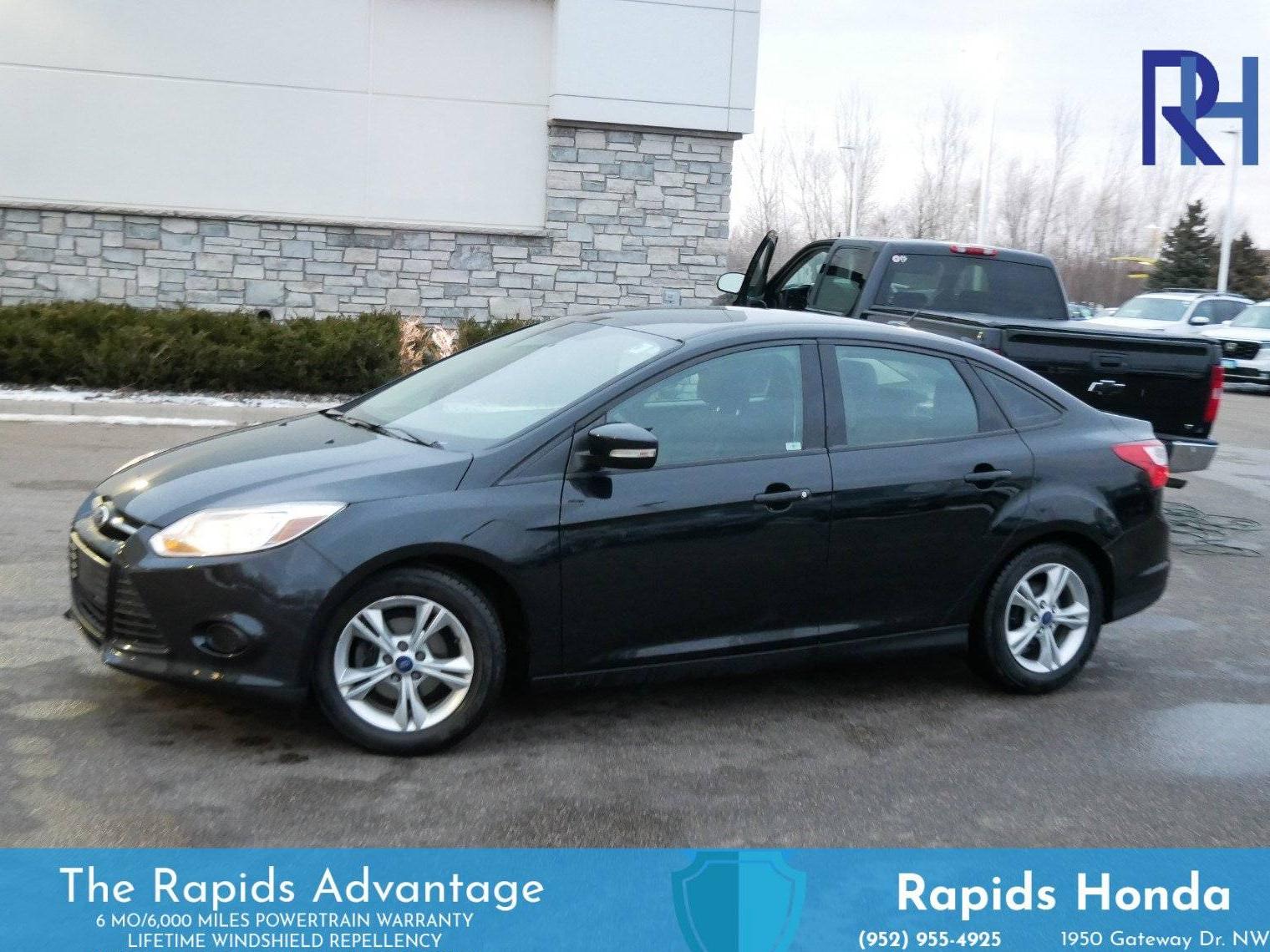 FORD FOCUS 2014 1FADP3F20EL199683 image