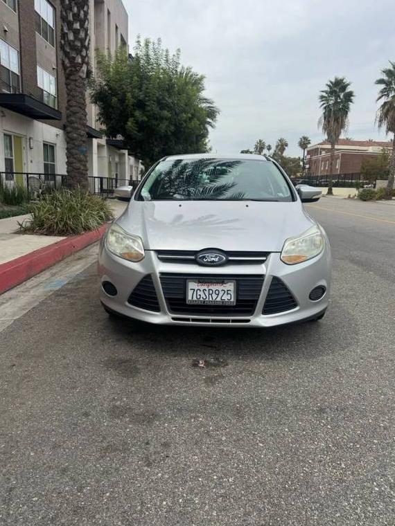 FORD FOCUS 2014 1FADP3F22EL349986 image