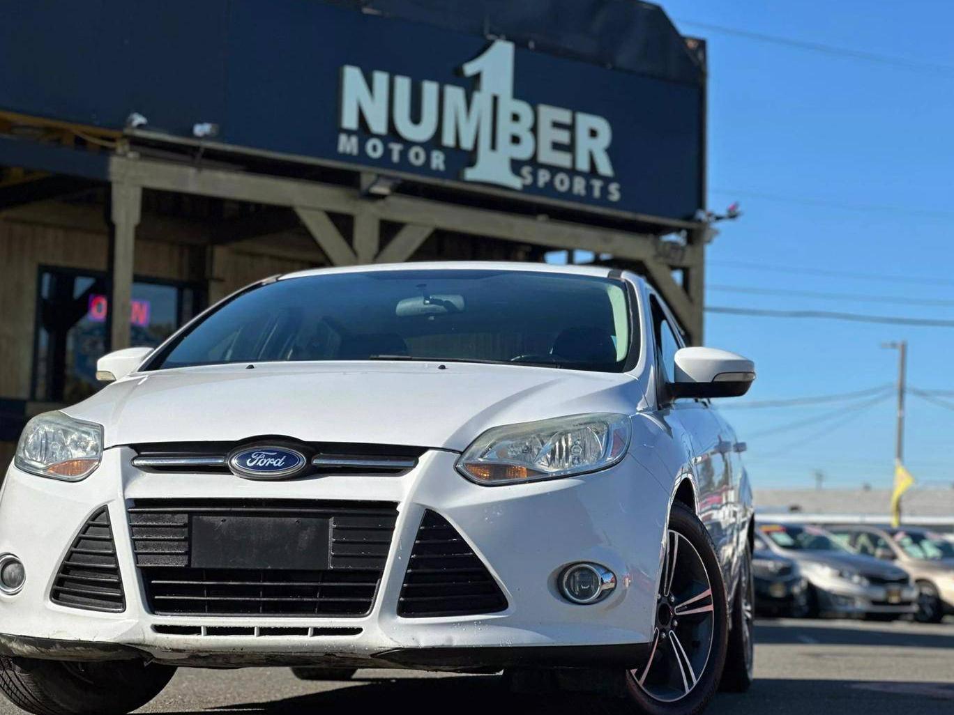 FORD FOCUS 2014 1FADP3F20EL311799 image