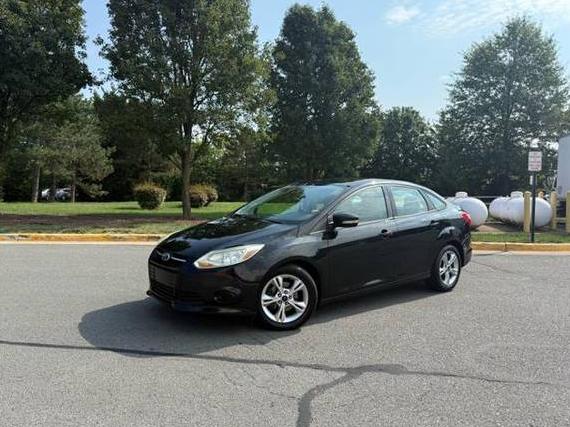 FORD FOCUS 2014 1FADP3F24EL244527 image