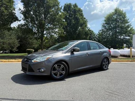 FORD FOCUS 2014 1FADP3F21EL253752 image