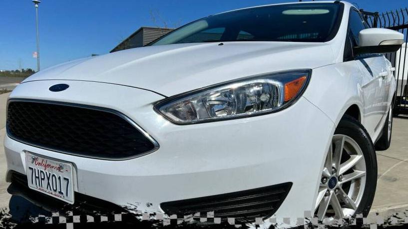 FORD FOCUS 2015 1FADP3F29FL380931 image