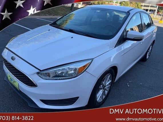 FORD FOCUS 2015 1FADP3F23FL260039 image