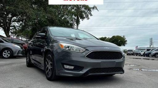 FORD FOCUS 2015 1FADP3F29FL360212 image