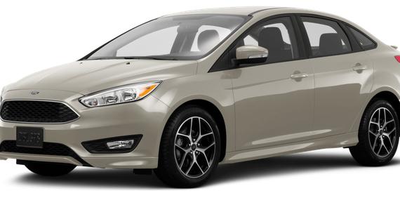 FORD FOCUS 2015 1FADP3F24FL254587 image