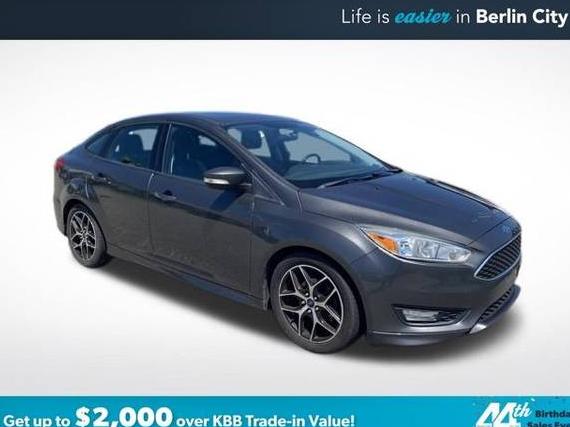 FORD FOCUS 2015 1FADP3F26FL310528 image