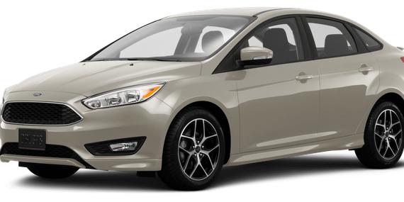 FORD FOCUS 2015 1FADP3F29FL385708 image