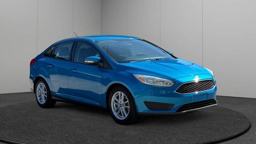 FORD FOCUS 2015 1FADP3F23FL240132 image