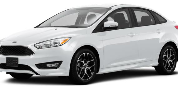 FORD FOCUS 2015 1FADP3F23FL386384 image