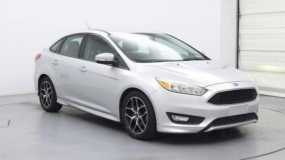 FORD FOCUS 2015 1FADP3F20FL215589 image