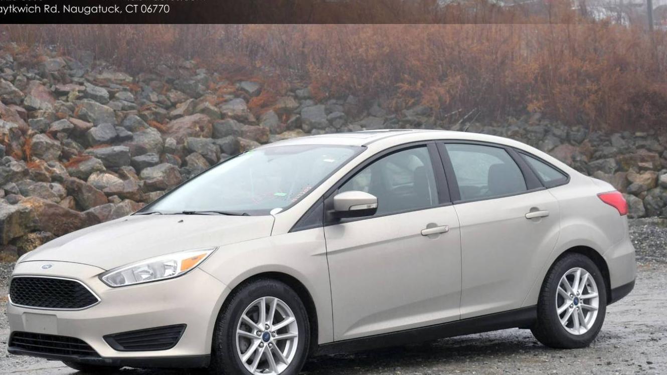 FORD FOCUS 2015 1FADP3F29FL214036 image