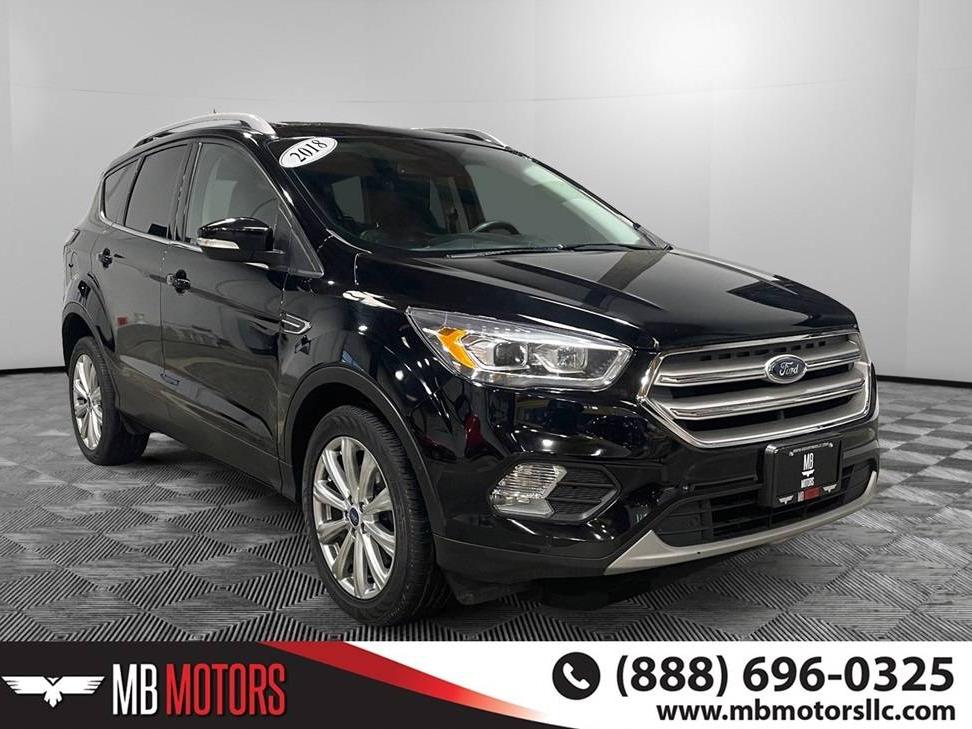 FORD ESCAPE 2018 1FMCU9J99JUC64519 image