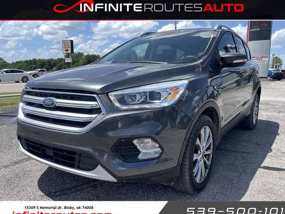 FORD ESCAPE 2018 1FMCU9J95JUC79843 image
