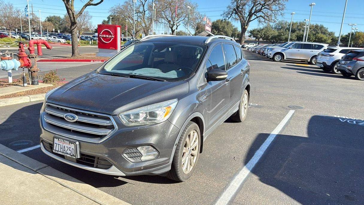 FORD ESCAPE 2017 1FMCU9J90HUA51100 image