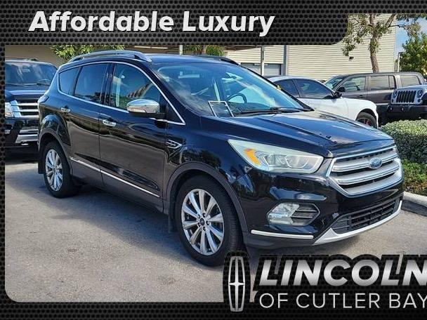 FORD ESCAPE 2017 1FMCU0J93HUD35087 image