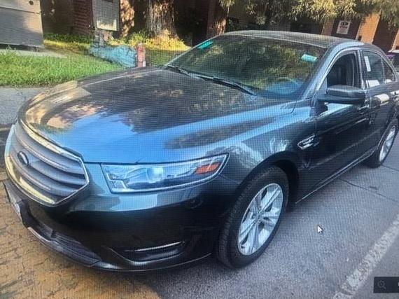 FORD TAURUS 2018 1FAHP2E81JG125368 image