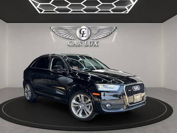 AUDI Q3 2015 WA1GFCFS8FR000933 image