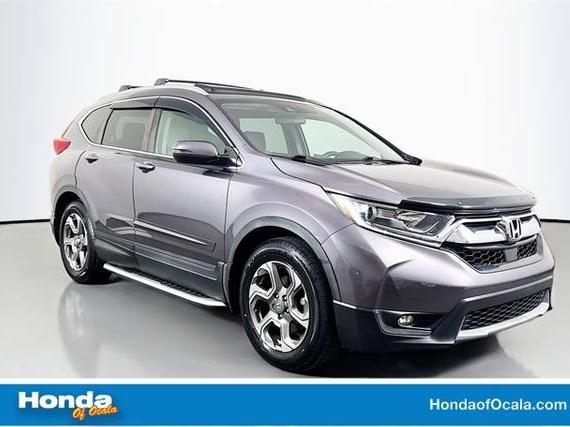 HONDA CR-V 2018 7FARW1H51JE052322 image