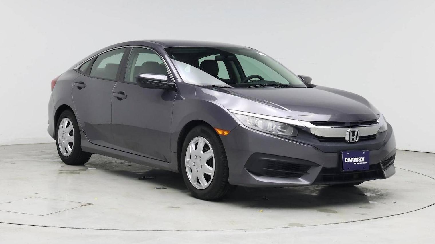 HONDA CIVIC 2018 19XFC2F51JE038247 image