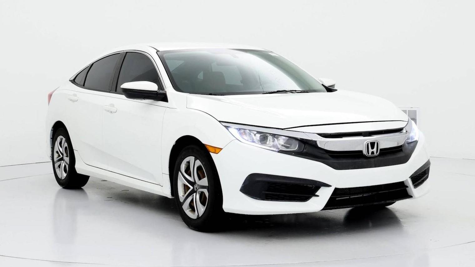 HONDA CIVIC 2018 19XFC2E53JE011228 image