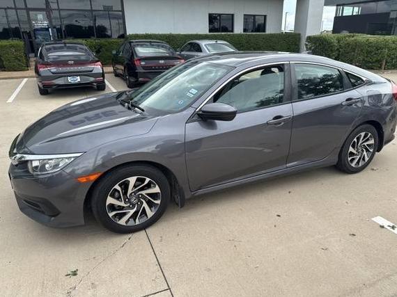 HONDA CIVIC 2018 2HGFC2F74JH606076 image