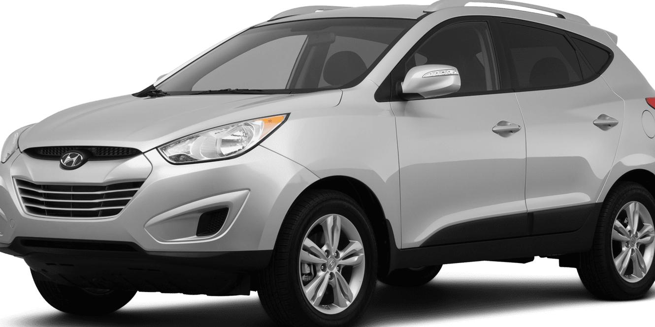 HYUNDAI TUCSON 2012 KM8JUCAC7CU530008 image