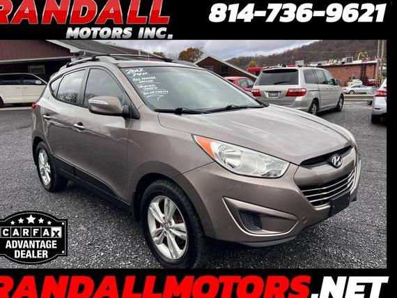 HYUNDAI TUCSON 2012 KM8JUCAC0CU402810 image