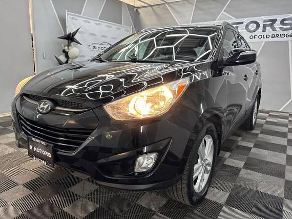 HYUNDAI TUCSON 2013 KM8JUCAC3DU567364 image